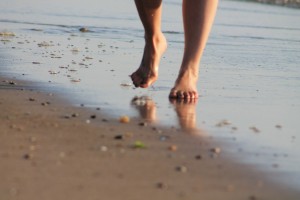 reflexology feet on beach